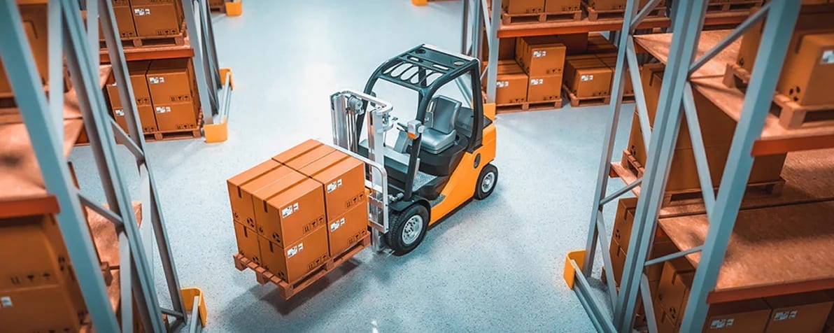 Forklift moving boxed stock through a fulfilment warehouse