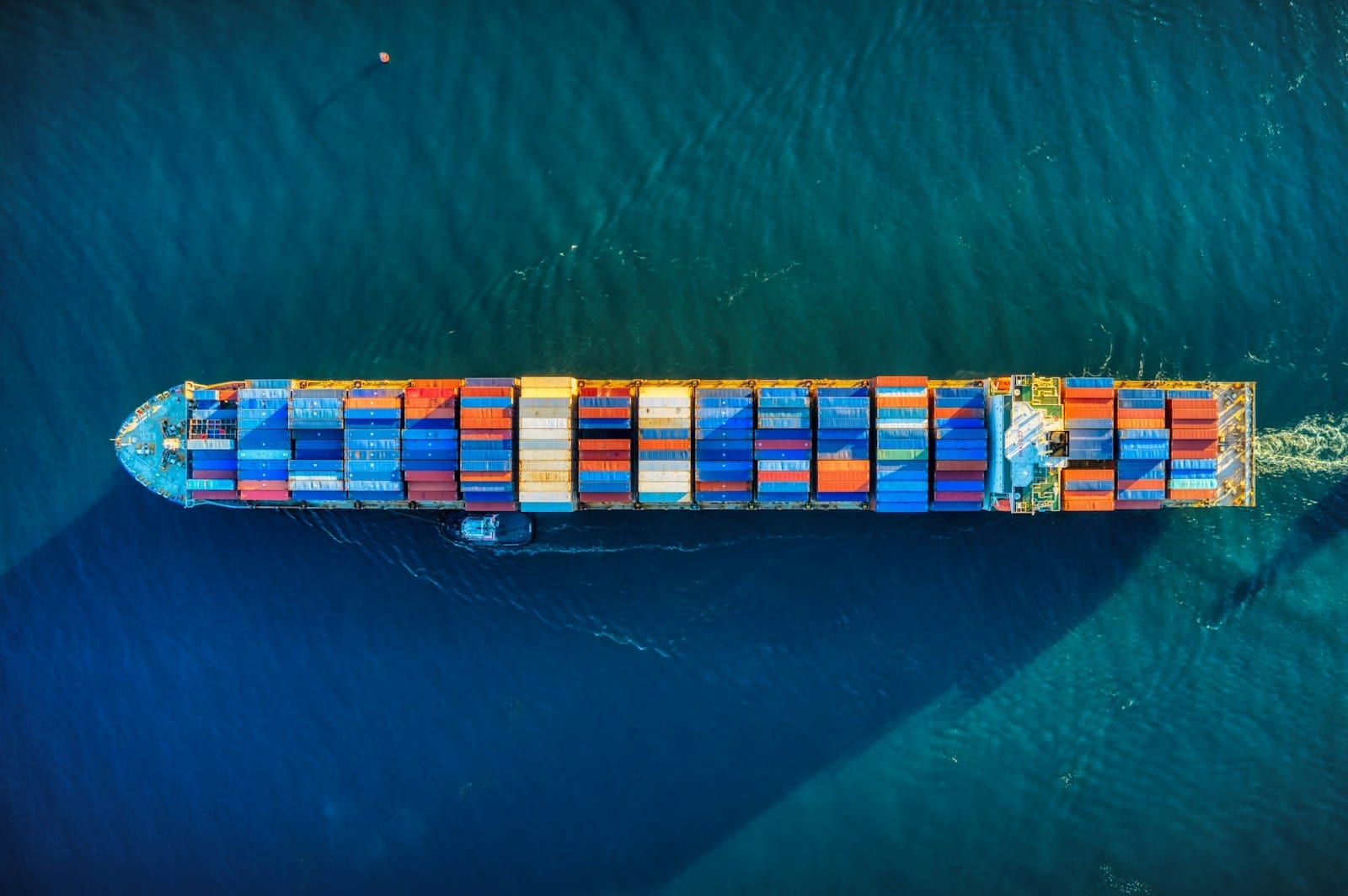 Export containers crossing open sea from Karachi