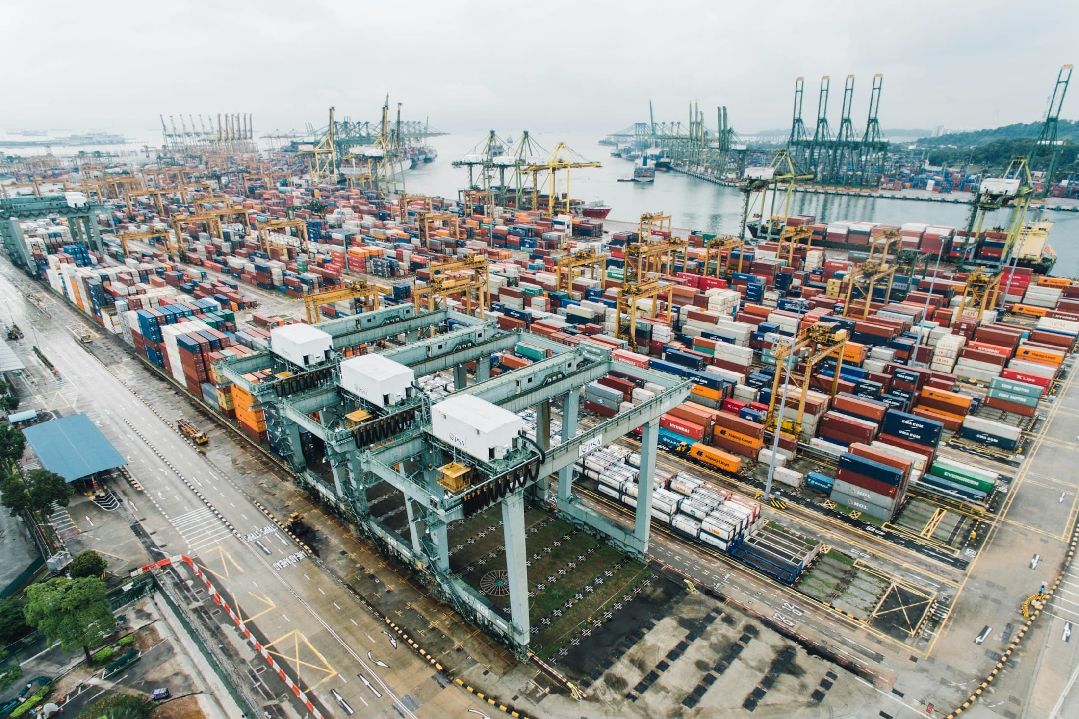 Aerial view of container terminals and cranes at a major seaport